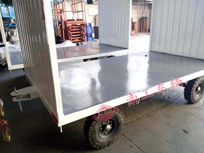 1676600136503847.jpg 白色雨篷平板拖車4I.jpg