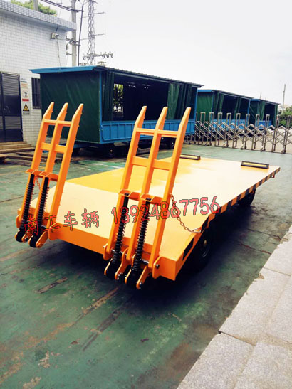 1676945965821479.jpg 橙色帶爬梯平板拖車1I.jpg
