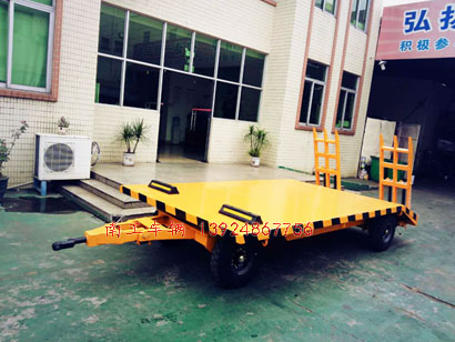 1676946000186358.jpg 橙色帶爬梯平板拖車3I.jpg